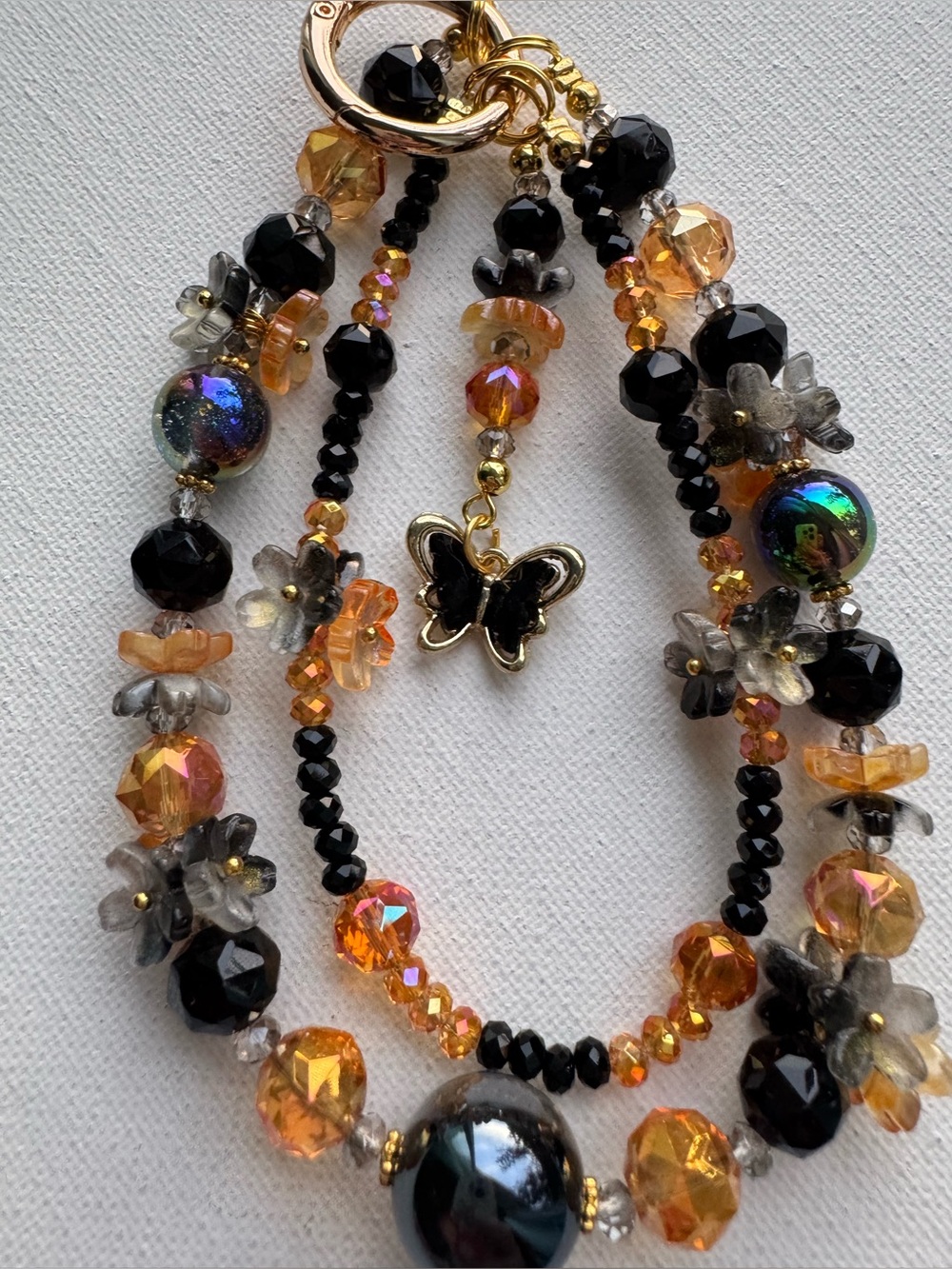 Handmade Black and Orange Beaded with Butterfly Charm